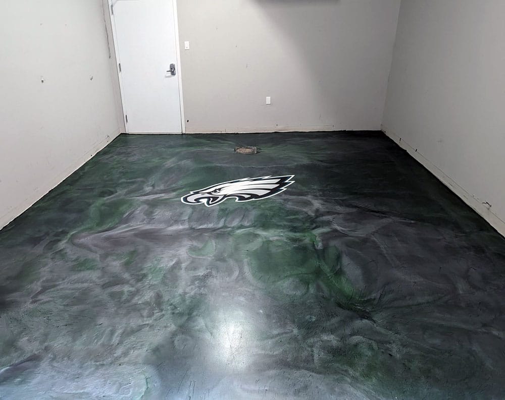 metalllic epoxy flooring with Eagles logo